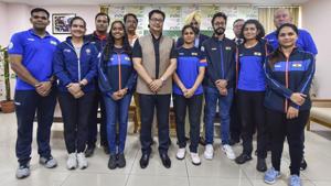 Union Sports Minister Kiren Rijiju in a group photo with members of the Indian shooting team.(PTI)