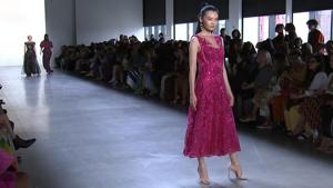This Thursday, Sept. 5, 2019 image taken from video shows a model wearing fashion from the Tadashi Shoji Spring/Summer 2020 collection furing Fashion Week in New York. (AP Photo/Juan Carlos Velasquez)(AP) This Thursday, Sept. 5, 2019 image taken from video shows a model wearing fashion from the Tadashi Shoji Spring/Summer 2020 collection furing Fashion Week in New York. (AP Photo/Juan Carlos Velasquez)(AP)