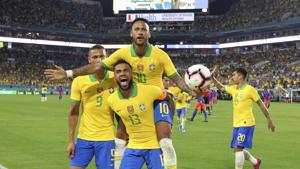 Miami Gardens: Brazil forward Neymar (10) celebrates with Dani Alves (13) and Richarlison (9) after scoring the second goal of his team during the second half of an international friendly soccer match against Colombia, Friday, Sept. 6, 2019, in Miami Gardens(AP) Miami Gardens: Brazil forward Neymar (10) celebrates with Dani Alves (13) and Richarlison (9) after scoring the second goal of his team during the second half of an international friendly soccer match against Colombia, Friday, Sept. 6, 2019, in Miami Gardens(AP)