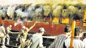 The state government on Friday told the Gujarat high court that it will table part two of the justice Nanavati-Mehta Commission report on the 2002 Gujarat riots before the Legislative Assembly in the budget session.(AP) The state government on Friday told the Gujarat high court that it will table part two of the justice Nanavati-Mehta Commission report on the 2002 Gujarat riots before the Legislative Assembly in the budget session.(AP)
