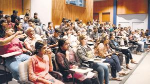 Students, scientists and faculty at Inter-University centre for Astronomy and Astrophysics, along with some of their family members, watch live streaming of the moon mission.(Milind Saurkar/HT Photo) Students, scientists and faculty at Inter-University centre for Astronomy and Astrophysics, along with some of their family members, watch live streaming of the moon mission.(Milind Saurkar/HT Photo)
