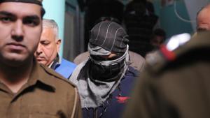 The CBI produces a Class 11 student (Face Covered) in Pradyuman Thakur murder case of Ryan International School in (Juvenile Justice Board) JJB. 16 year old juvenile accused will be treated as an adult; the juvenile justice board pronounced the order, in Gurgaon, India, on Wednesday, 20 December 2017. ( Photo by/Hindustan Times)(Parveen Kumar/ HT Photo) The CBI produces a Class 11 student (Face Covered) in Pradyuman Thakur murder case of Ryan International School in (Juvenile Justice Board) JJB. 16 year old juvenile accused will be treated as an adult; the juvenile justice board pronounced the order, in Gurgaon, India, on Wednesday, 20 December 2017. ( Photo by/Hindustan Times)(Parveen Kumar/ HT Photo)