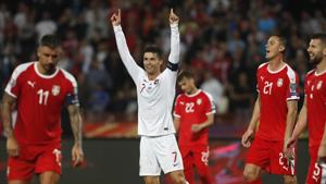 Cristiano Ronaldo celebrates after Portugal's Bernardo Silva scored his side's fourth goal during the Euro 2020 group B qualifying match.(AP) Cristiano Ronaldo celebrates after Portugal's Bernardo Silva scored his side's fourth goal during the Euro 2020 group B qualifying match.(AP)