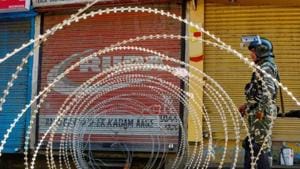 A security person stands guard at a blocked road during restrictions, after the abrogration of Article of 370 and bifurcation of state, Srinagar, September 9, 2019(PTI) A security person stands guard at a blocked road during restrictions, after the abrogration of Article of 370 and bifurcation of state, Srinagar, September 9, 2019(PTI)