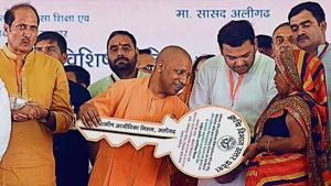 Chief Minister Yogi Adityanath inaugurating various schemes at the Iglas tehsil in Aligarh, Uttar Pradesh, on Saturday.(ANI) Chief Minister Yogi Adityanath inaugurating various schemes at the Iglas tehsil in Aligarh, Uttar Pradesh, on Saturday.(ANI)