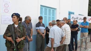Some 13,000 polling booths opened across Tunisia at 8:00 am (0700 GMT) on Sunday, with two dozen candidates vying for a five-year mandate.(REUTERS) Some 13,000 polling booths opened across Tunisia at 8:00 am (0700 GMT) on Sunday, with two dozen candidates vying for a five-year mandate.(REUTERS)