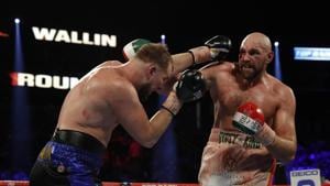 Tyson Fury in action with Otto Wallin.(REUTERS) Tyson Fury in action with Otto Wallin.(REUTERS)