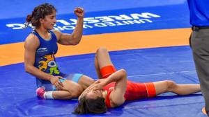Vinesh Phogat celebrates after winning the Gold medal in women's freestyle 50 kg wrestling at the Asian Games 2018.(PTI) Vinesh Phogat celebrates after winning the Gold medal in women's freestyle 50 kg wrestling at the Asian Games 2018.(PTI)