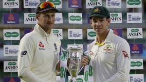 England's Joe Root, left, and Australia's Tim Paine hold the trophy during the presentation ceremony(AP) England's Joe Root, left, and Australia's Tim Paine hold the trophy during the presentation ceremony(AP)
