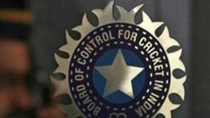 A policeman walks past a logo of the Board of Control for Cricket in India (BCCI).(REUTERS) A policeman walks past a logo of the Board of Control for Cricket in India (BCCI).(REUTERS)