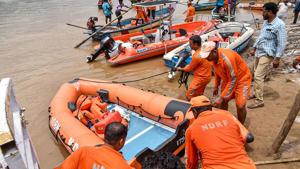NDRF personnel carry out rescue operations after a tourist boat capsized in the swollen Godavari river in East Godavari district of Andhra Pradesh.(Photo: PTI) NDRF personnel carry out rescue operations after a tourist boat capsized in the swollen Godavari river in East Godavari district of Andhra Pradesh.(Photo: PTI)