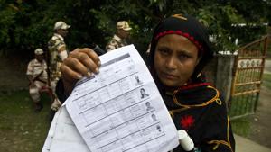 A woman displays a document that shows inclusion of her name in the final list of the National Register of Citizens (NRC) in Pabhokati village in Assam’s Morigaon district .(AP Photo) A woman displays a document that shows inclusion of her name in the final list of the National Register of Citizens (NRC) in Pabhokati village in Assam’s Morigaon district .(AP Photo)