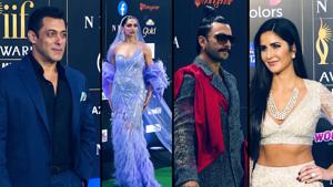 <p>Bollywood celebs made heads turn on the green carpet of IIFA 2019. The award show witnessed a fashionable green carpet on the big night. Deepika Padukone donned a lilac lace gown designed by Gaurav Gupta. Ranveer Singh was dressed in a grey tweed tuxedo and a red sash with black boots. Ranveer won the Best Leading Actor (Male) award for his performance in Padmaavat.</p>