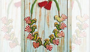Hand-painted leather puppetry bird necklace from Andhra Pradesh Hand-painted leather puppetry bird necklace from Andhra Pradesh