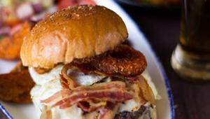 The steak tenderloin burger at Indigo Deli, which has made excellent burgers since its birth in 2005. The steak tenderloin burger at Indigo Deli, which has made excellent burgers since its birth in 2005.