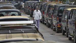 A commuter walks past the parked taxis during a strike call by United Front of Transport Associations against the hefty penalities for road traffic violations under the amended Motor Vehicles Act, at Nizamuddin Railway Station, in New Delhi, India, on Thursday, September 19, 2019.(Burhaan Kinu/HT PHOTO) A commuter walks past the parked taxis during a strike call by United Front of Transport Associations against the hefty penalities for road traffic violations under the amended Motor Vehicles Act, at Nizamuddin Railway Station, in New Delhi, India, on Thursday, September 19, 2019.(Burhaan Kinu/HT PHOTO)