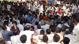 Villagers in Ranideshipura, about 150 km from Barmer in Rajasthan staging a protest on Sunday after India’s champion rally driver Gaurav Gill crashed into a motorcycle killing three persons on Saturday during the Jodhpur leg of the National rally Championship.(HT PHOTO) Villagers in Ranideshipura, about 150 km from Barmer in Rajasthan staging a protest on Sunday after India’s champion rally driver Gaurav Gill crashed into a motorcycle killing three persons on Saturday during the Jodhpur leg of the National rally Championship.(HT PHOTO)