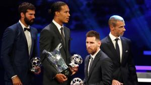 Virgil van Dijk and Barcelona's Lionel Messi.(REUTERS) Virgil van Dijk and Barcelona's Lionel Messi.(REUTERS)