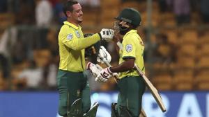 South Africa's captain Quinton de Kock, left, celebrates with his batting partner Temba Bavuma.(AP) South Africa's captain Quinton de Kock, left, celebrates with his batting partner Temba Bavuma.(AP)