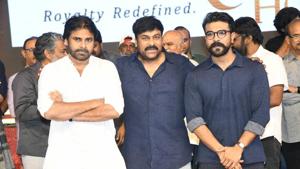 Pawan Kalyan, Chiranjeevi and Ram Charan at Sye Raa Narasimha Reddy pre-release event. Pawan Kalyan, Chiranjeevi and Ram Charan at Sye Raa Narasimha Reddy pre-release event.