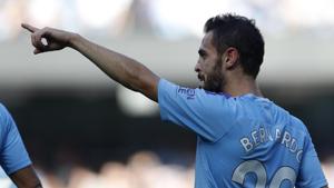 Manchester City's Bernardo Silva celebrates after scoring his sides fifth goal against Watford.(AP)
