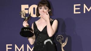 Maisie Williams poses in the press room with the award for outstanding drama series for Maisie Williams poses in the press room with the award for outstanding drama series for