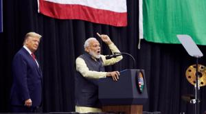 U.S. President Donald Trump looks on as Indian Prime Minister Narendra Modi speaks during a 