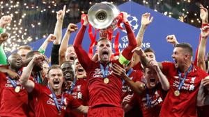 Liverpool's Jordan Henderson celebrates with the trophy and team mates after winning the Champions League Final.(REUTERS) Liverpool's Jordan Henderson celebrates with the trophy and team mates after winning the Champions League Final.(REUTERS)