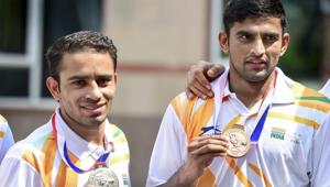 Boxers Amit Panghal and Manish Kaushik pose with their silver and bronze medals that they won at the recent World Boxing Championships(PTI) Boxers Amit Panghal and Manish Kaushik pose with their silver and bronze medals that they won at the recent World Boxing Championships(PTI)