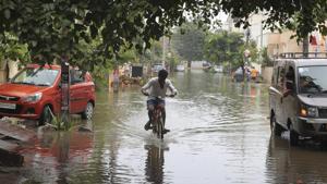 The heavy rains inundated several roads, colonies and low-lying areas in different parts of the city. There were traffic snarls in the upscale Banjara Hills, Jubilee Hills and IT hub like Madhapur.(AP Photo) The heavy rains inundated several roads, colonies and low-lying areas in different parts of the city. There were traffic snarls in the upscale Banjara Hills, Jubilee Hills and IT hub like Madhapur.(AP Photo)