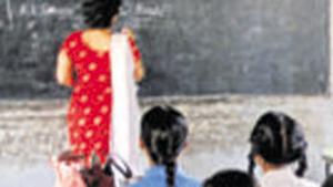 Teacher Namita Bhagat, in class with the students at M C Primary School Dilshad Garden, O Block Delhi(Hindustan Times Media) Teacher Namita Bhagat, in class with the students at M C Primary School Dilshad Garden, O Block Delhi(Hindustan Times Media)