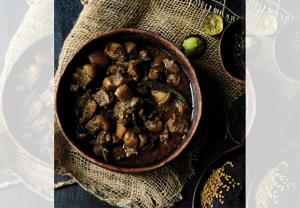At the big village feasts and celebrations, besides the barbequed pork, there is always a deep, rich, pandi curry!(Kaveri Ponnapa) At the big village feasts and celebrations, besides the barbequed pork, there is always a deep, rich, pandi curry!(Kaveri Ponnapa)