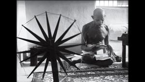 A 1964 photohraph of Gandhi taken by Margaret Bourke White shows him reading clippings with a charkha in the foreground.(Photo courtesy: National Gandhi museum) A 1964 photohraph of Gandhi taken by Margaret Bourke White shows him reading clippings with a charkha in the foreground.(Photo courtesy: National Gandhi museum)