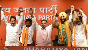 Indian Olympic medalist Yogeshwar Dutt (2L), Former India Hockey team captain Sandeep Singh (2R) and Former Shiromani Akali Dal (SAD) MLA Balkaur Singh (R) join Bharatiya Janata Party (BJP), at BJP headquarter, in New Delhi, India, on Thursday, September 26, 2019.(Mohd Zakir/HT PHOTO) Indian Olympic medalist Yogeshwar Dutt (2L), Former India Hockey team captain Sandeep Singh (2R) and Former Shiromani Akali Dal (SAD) MLA Balkaur Singh (R) join Bharatiya Janata Party (BJP), at BJP headquarter, in New Delhi, India, on Thursday, September 26, 2019.(Mohd Zakir/HT PHOTO)