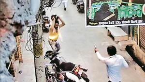 A video grab shows an armed man opening fire at a 54-year-old man in northeast Delhi’s Brahmpuri on Thursday. A video grab shows an armed man opening fire at a 54-year-old man in northeast Delhi’s Brahmpuri on Thursday.