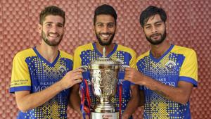 Real Kashmir FC players holding second division league trophy in New Delhi on June 3, 2018.(PTI)