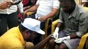 BJD MLA Manohar Randhari was seen washing feet of sanitation workers at a Swachh Bharat function.(Photo: Screengrab/ HT Video) BJD MLA Manohar Randhari was seen washing feet of sanitation workers at a Swachh Bharat function.(Photo: Screengrab/ HT Video)