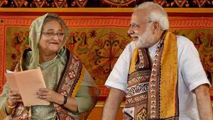 Prime Minister Narendra Modi speaks with his Bangladeshi counterpart Sheikh Hasina during the annual convocation of Visva Bharati University, in Birbhum, on Friday.(Photo:PTI) Prime Minister Narendra Modi speaks with his Bangladeshi counterpart Sheikh Hasina during the annual convocation of Visva Bharati University, in Birbhum, on Friday.(Photo:PTI)