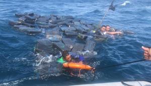 Three suspected drug smugglers survived in shark-infested Pacific waters by clinging for hours to floating bales of cocaine, Colombia’s navy said Tuesday.(@ArmadaColombia/Twitter) Three suspected drug smugglers survived in shark-infested Pacific waters by clinging for hours to floating bales of cocaine, Colombia’s navy said Tuesday.(@ArmadaColombia/Twitter)