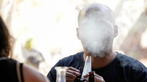 A customer smokes at Lowell Farms, America's first official Cannabis Cafe offering farm-to-table dining and smoking of cannabis in West Hollywood, California, October 1.(REUTERS) A customer smokes at Lowell Farms, America's first official Cannabis Cafe offering farm-to-table dining and smoking of cannabis in West Hollywood, California, October 1.(REUTERS)