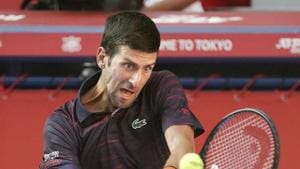 Tokyo: Novak Djokovic of Serbia plays a shot against Australian Alexei Popyrin.(AP) Tokyo: Novak Djokovic of Serbia plays a shot against Australian Alexei Popyrin.(AP)