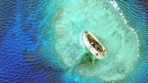 Satellite images show Vietnam has carried out significant land reclamation at two sites in the disputed South China Sea, but the scale and pace of the work is dwarfed by that of China, a US research institute said.(Reuters File Photo)