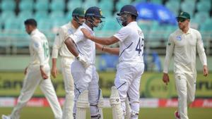 India's Mayank Agarwal is greeted by batsman Rohit Sharma after scoring a maiden century on the 2nd day of the first test cricket match against South Africa in Visakhapatnam.(PTI) India's Mayank Agarwal is greeted by batsman Rohit Sharma after scoring a maiden century on the 2nd day of the first test cricket match against South Africa in Visakhapatnam.(PTI)
