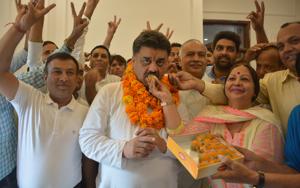 Congress candidate Chander Mohan with his supporters at his residence in Panchkula on October 3.(Sant Arora/HT) Congress candidate Chander Mohan with his supporters at his residence in Panchkula on October 3.(Sant Arora/HT)