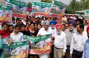 Punjab panchayats and rural development minister Tript Rajinder Singh Bajwa flagging off an awareness rally in Patiala on Friday.(HT PHOTO) Punjab panchayats and rural development minister Tript Rajinder Singh Bajwa flagging off an awareness rally in Patiala on Friday.(HT PHOTO)