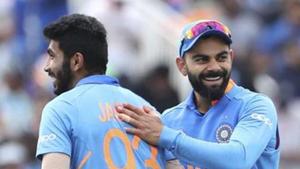 India's captain Virat Kohli, right, celebrates with teammate Jasprit Bumrah(AP) India's captain Virat Kohli, right, celebrates with teammate Jasprit Bumrah(AP)