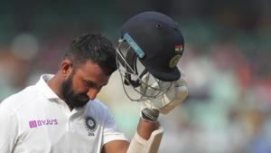 India's Cheteshwar Pujara leaves after being dismissed by South Africa's Vernon Philander during the fourth day of the first cricket test match against South Africa in Visakhapatnam.(AP) India's Cheteshwar Pujara leaves after being dismissed by South Africa's Vernon Philander during the fourth day of the first cricket test match against South Africa in Visakhapatnam.(AP)