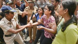 Police detain activists who were staging a protest against the tree-cutting, being carried out for the Metro car shed project, at Aarey colony in Mumbai, Saturday, Oct. 5, 2019.(PTI) Police detain activists who were staging a protest against the tree-cutting, being carried out for the Metro car shed project, at Aarey colony in Mumbai, Saturday, Oct. 5, 2019.(PTI)