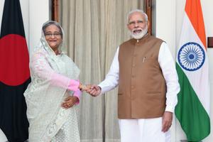 It is easy to understand why Mr Modi spoke to Ms Hasina about bilateral ties currently passing through a “(AFP) It is easy to understand why Mr Modi spoke to Ms Hasina about bilateral ties currently passing through a “(AFP)