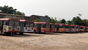 Buses stand at as TSRTC employees are on an indefinite strike demanding fulfilment of various demands including RTC merger with the Government, in Hyderabad on Saturday. (ANI Photo) Buses stand at as TSRTC employees are on an indefinite strike demanding fulfilment of various demands including RTC merger with the Government, in Hyderabad on Saturday. (ANI Photo)